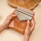    Sonolimba_Kalimba_21Tasten_afrikanisches_Korallenholz_C-Dur_Handgrosse